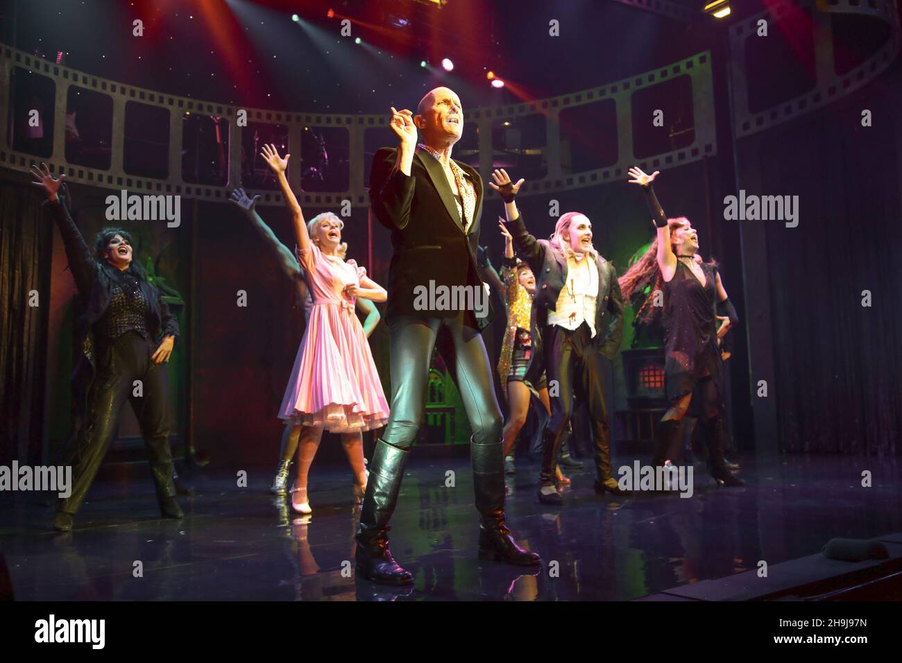 The cast of the Rocky Horror Show performing on stage at a press call at the Playhouse Theatre in London's West End Stock Photo