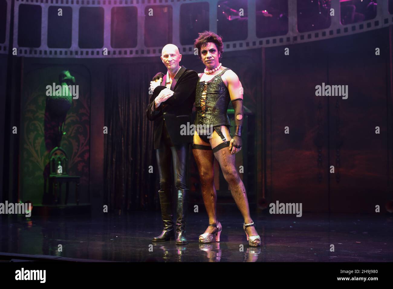 Richard O'Brien (left) and David Bedella in the Rocky Horror Show performing on stage at a press call at the Playhouse Theatre in London's West End Stock Photo