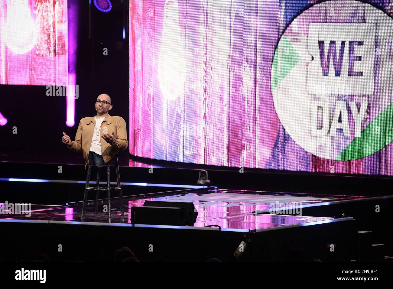 Spencer West on stage at the 2016 We Day charity event at Wembley SEE in London Stock Photo