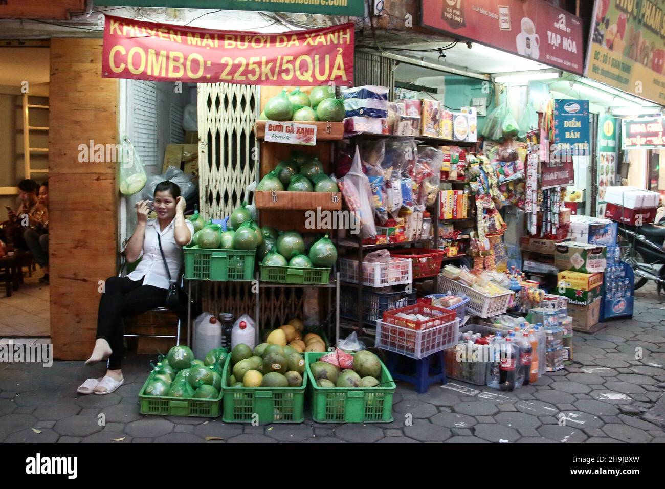 A fruit store on the streets of Hanoi in Vietnam. From a series of travel photos taken in Vietnam and Cambodia. Stock Photo