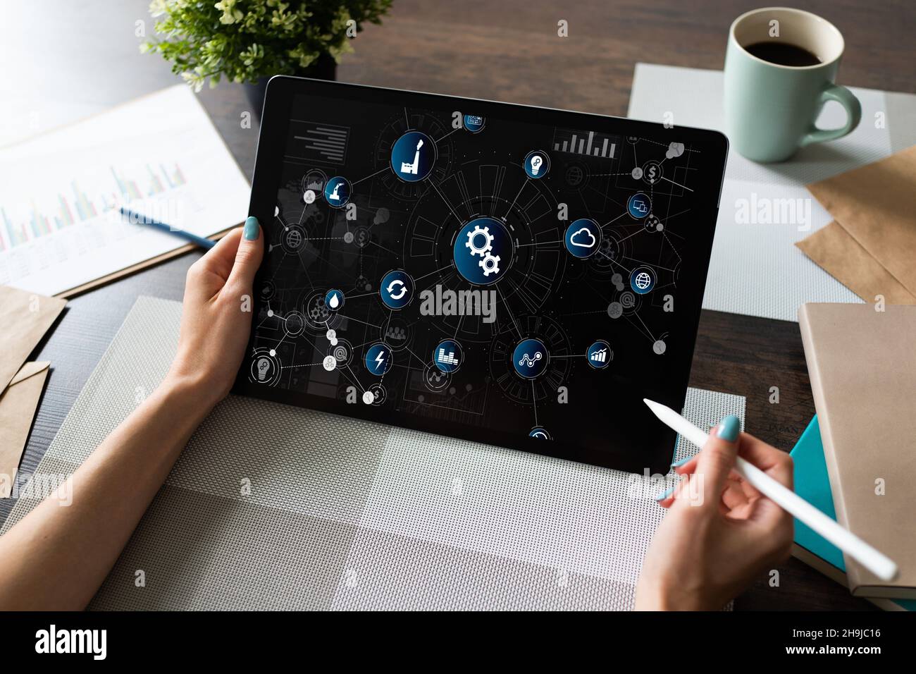 Business and manufacturing process automation concept on device screen. Stock Photo