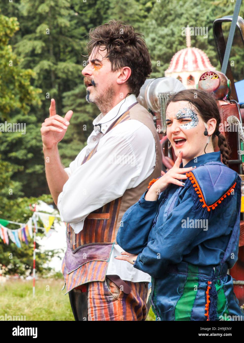 Philip Bosworth and Emily Essery of The Enfants Terribles theatre company performing The Fantastical Flying Exploratory Laboratory at the 2016 Latitude Festival Stock Photo