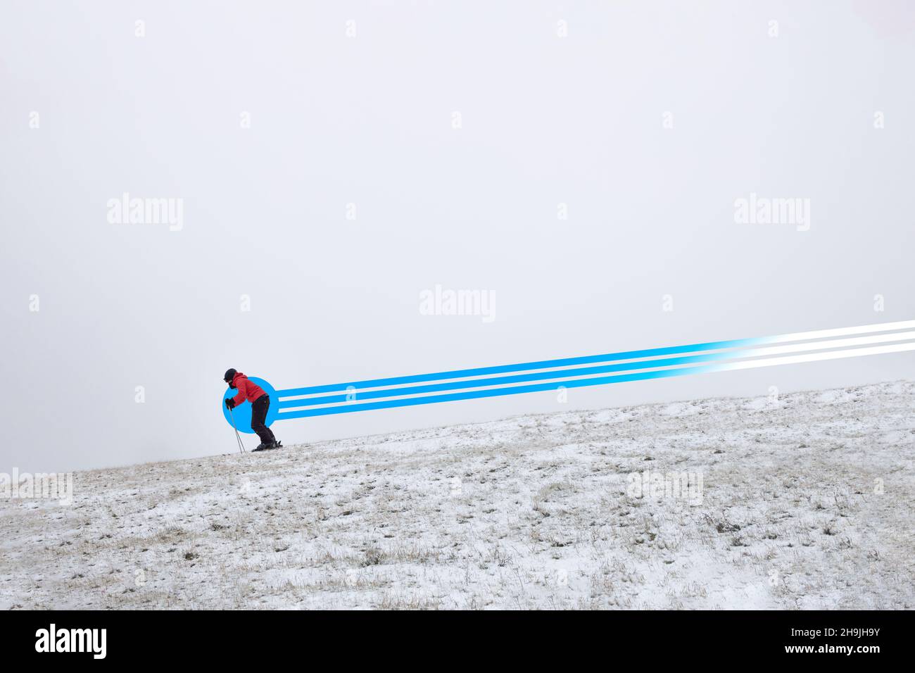 Skiing downhill during the winter Stock Photo