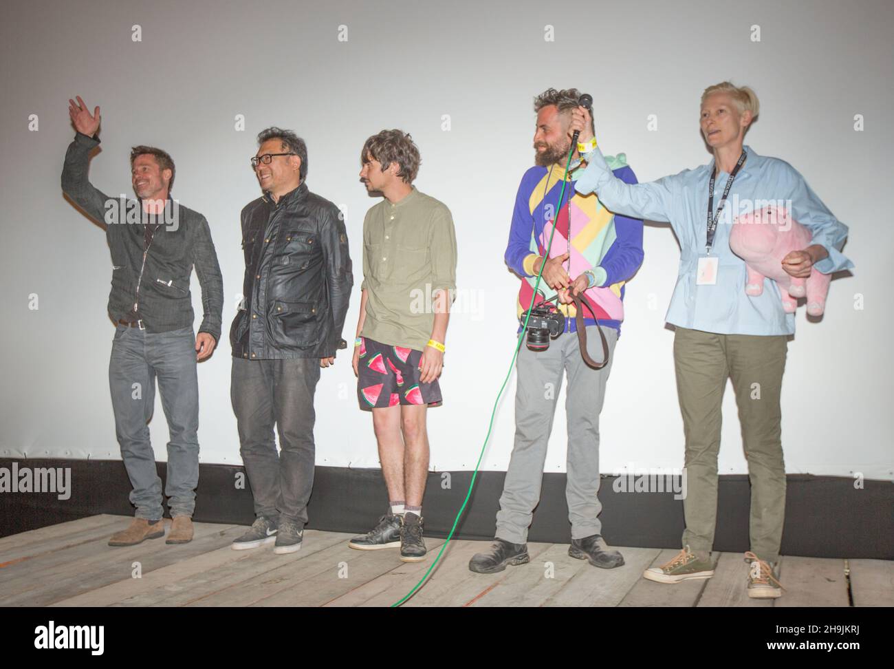 (left to right) Brad Pitt and Dooho Choi (co-producers) and member of the cast Devon Bostick, Sandro Kopp (co-producer) and member of the cast and co-producer Tilda Swinton introducing a special screening of the South-Korean American Netflix film Okja at the Pilton Palais cinema tent on Day 1 of the 2017 Glastonbury Festival at Worthy Farm in Somerset. Photo date: Saturday, June 24, 2017. Photo credit should read: Richard Gray/EMPICS Entertainment Stock Photo