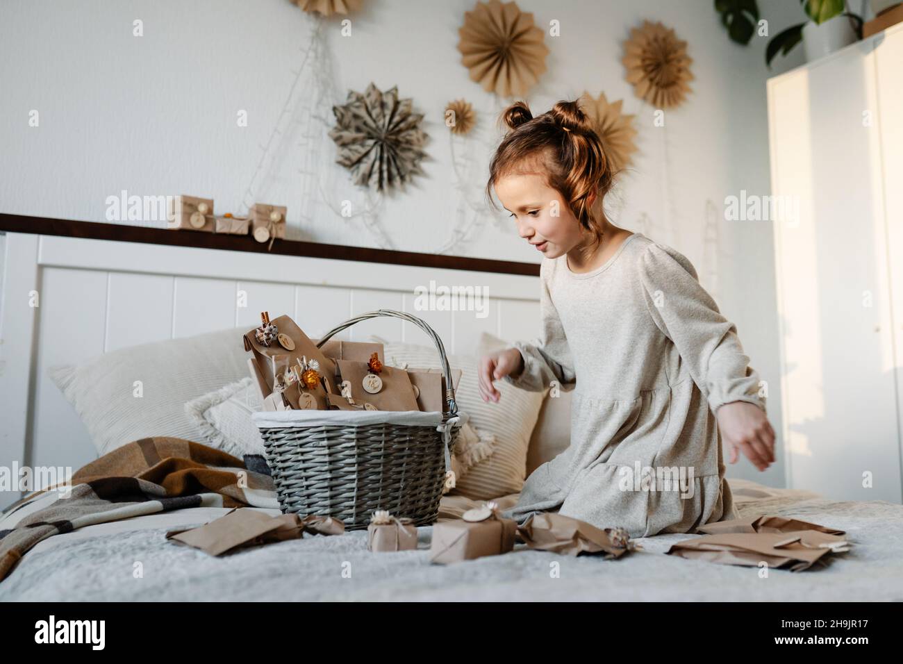 Christmas Advent calendar for kids decorated with dried flowers Stock