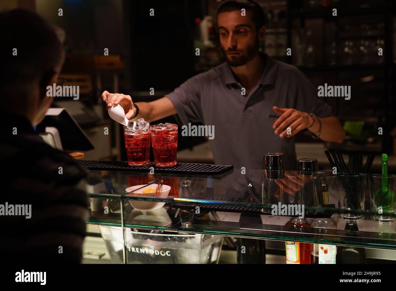 A bar tender serves two traditional spritzer drinks in Bologna. From a series of travel photos in Italy. Photo date: Friday, September 15, 2017. Photo credit should read: Richard Gray/EMPICS Entertainment Stock Photo