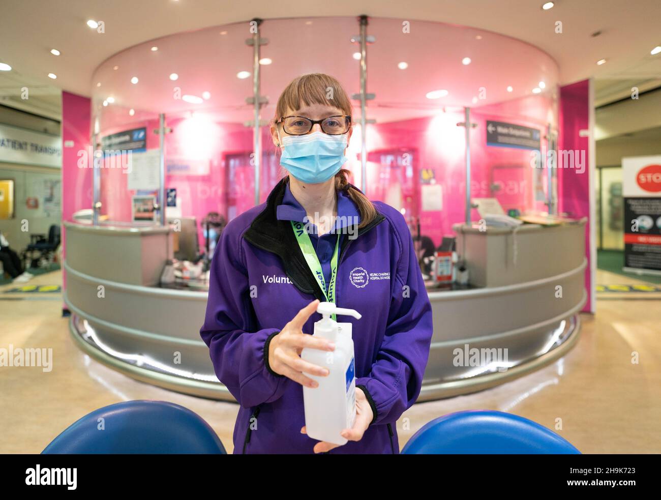 An Imperial Charity volunteer at a sanitising station in Charing Cross hospital as part of the charityÕs covid crisis response. Photo date: Wednesday, March 17, 2021. Photo credit should read: Richard Gray/EMPICS Stock Photo