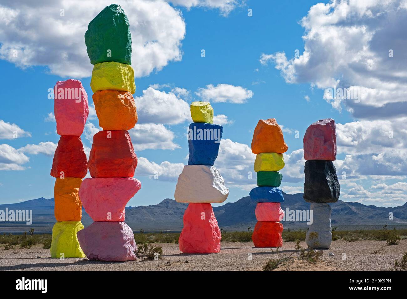 Seven Magic Mountains / Seven Sisters, art installation made of colorful, stacked boulders in Ivanpah Valley near Las Vegas, Nevada, United States, US Stock Photo