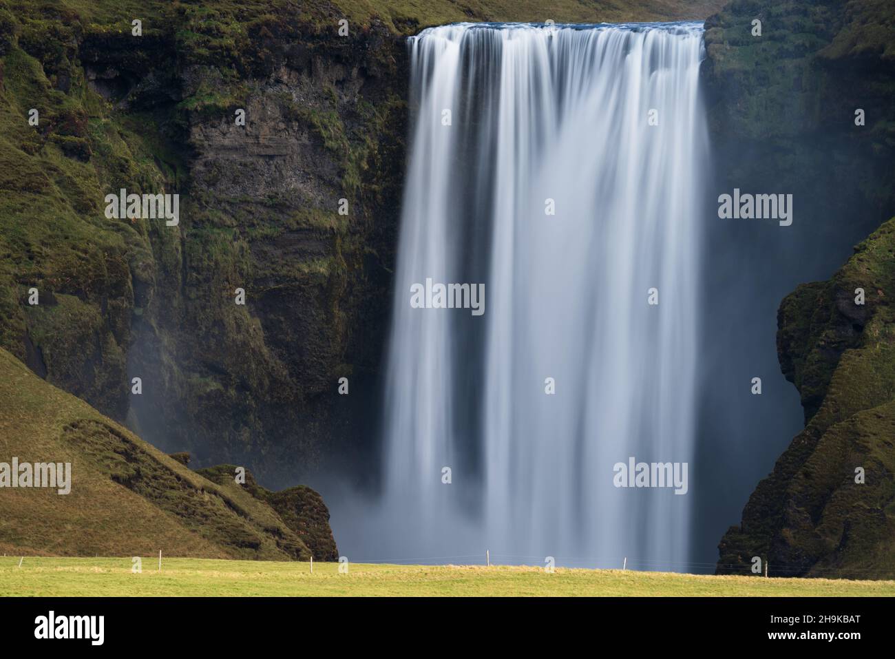 Long exposure of famous Skogafoss waterfall in Iceland from the distance Stock Photo
