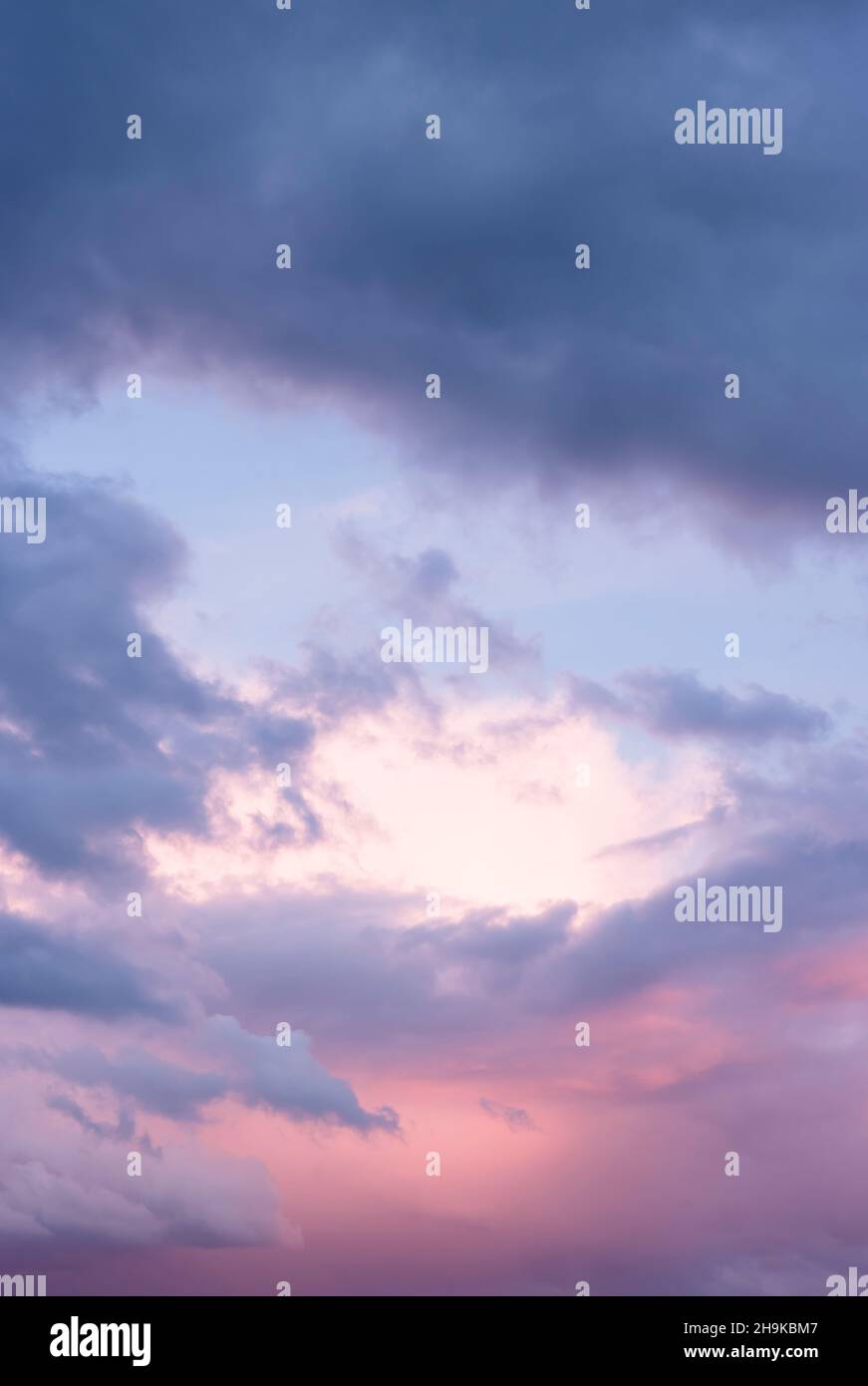 Dramatic sky at sunset with moody storm clouds before a thunder storm. Ideal for a background or template Stock Photo