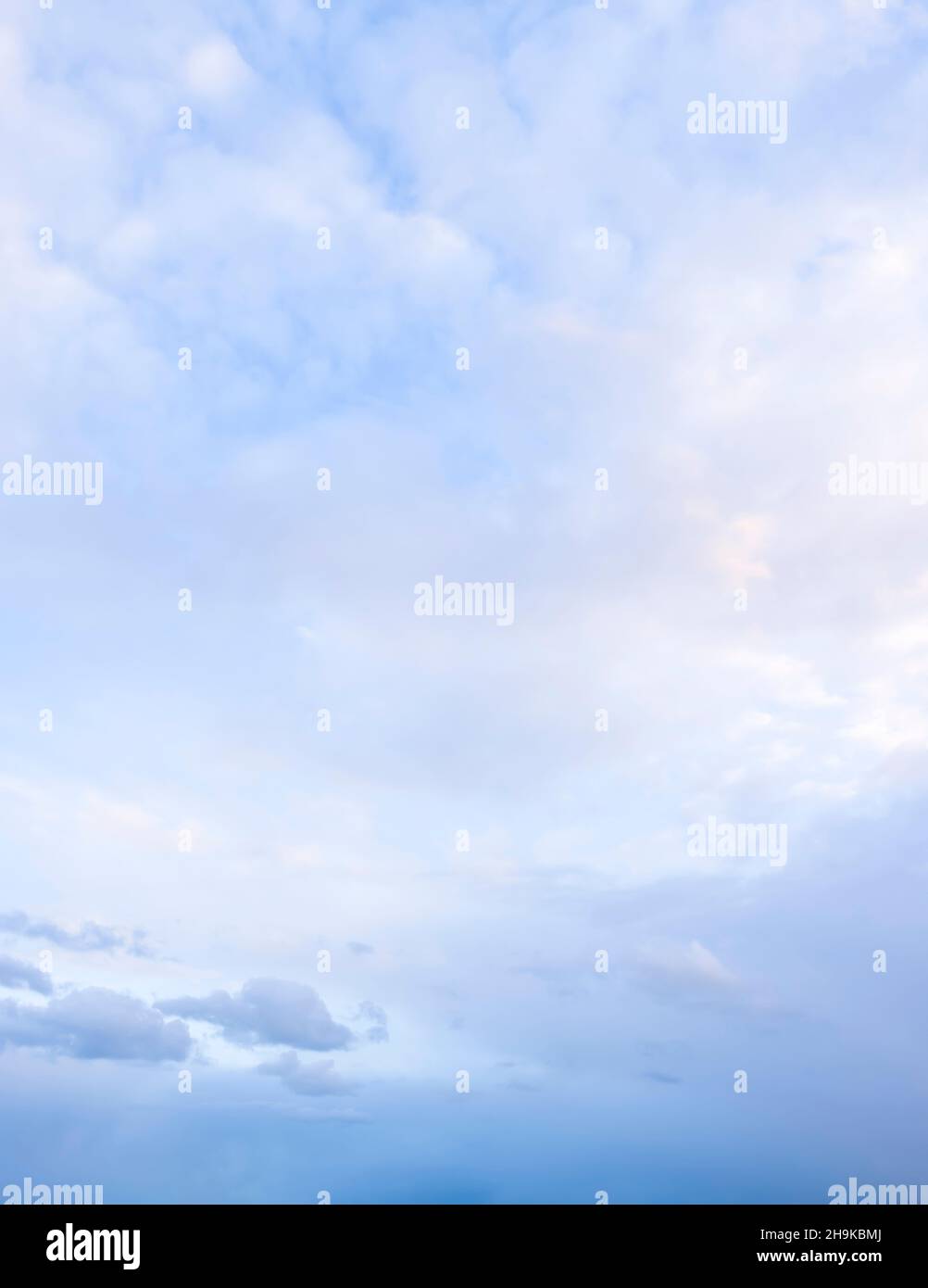 Blue sky and clouds with storm on horizon Stock Photo