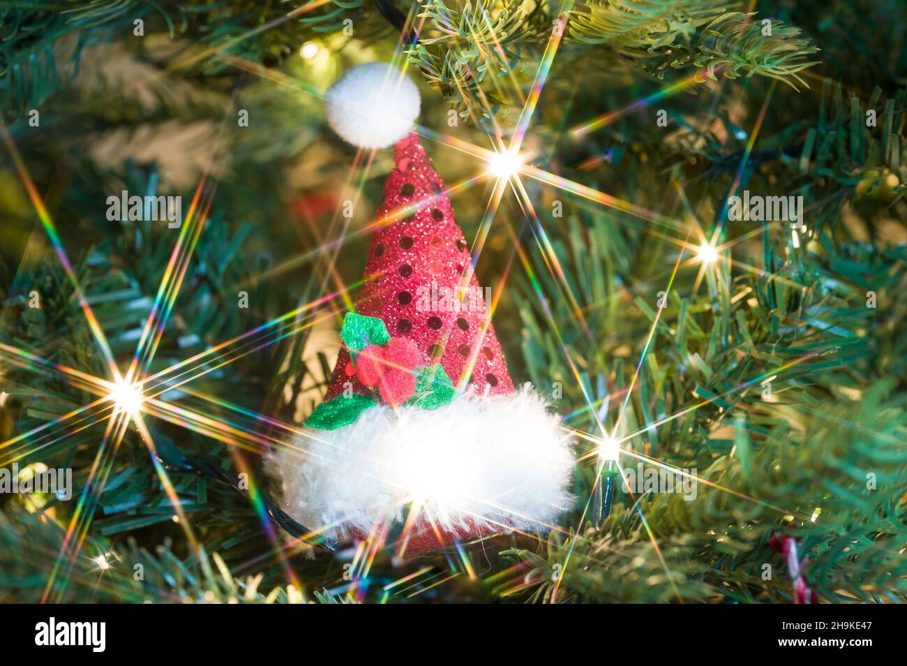 Beautiful Christmas decorations surrounded by lights Stock Photo