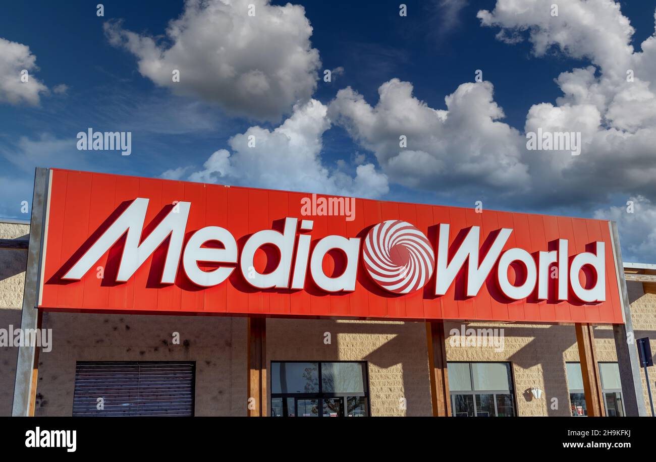 Moncalieri, Turin, Italy - December 6, 2021: Sign with logo of Media World store on the blue sky with clouds, it is stores selling consumer electronic Stock Photo