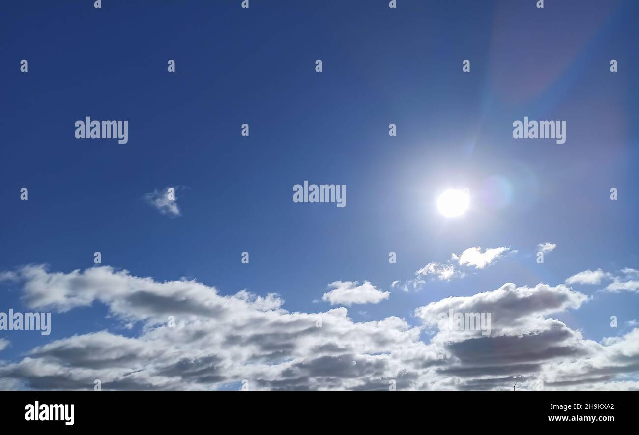 Sun in a clear blue sky for background Stock Photo