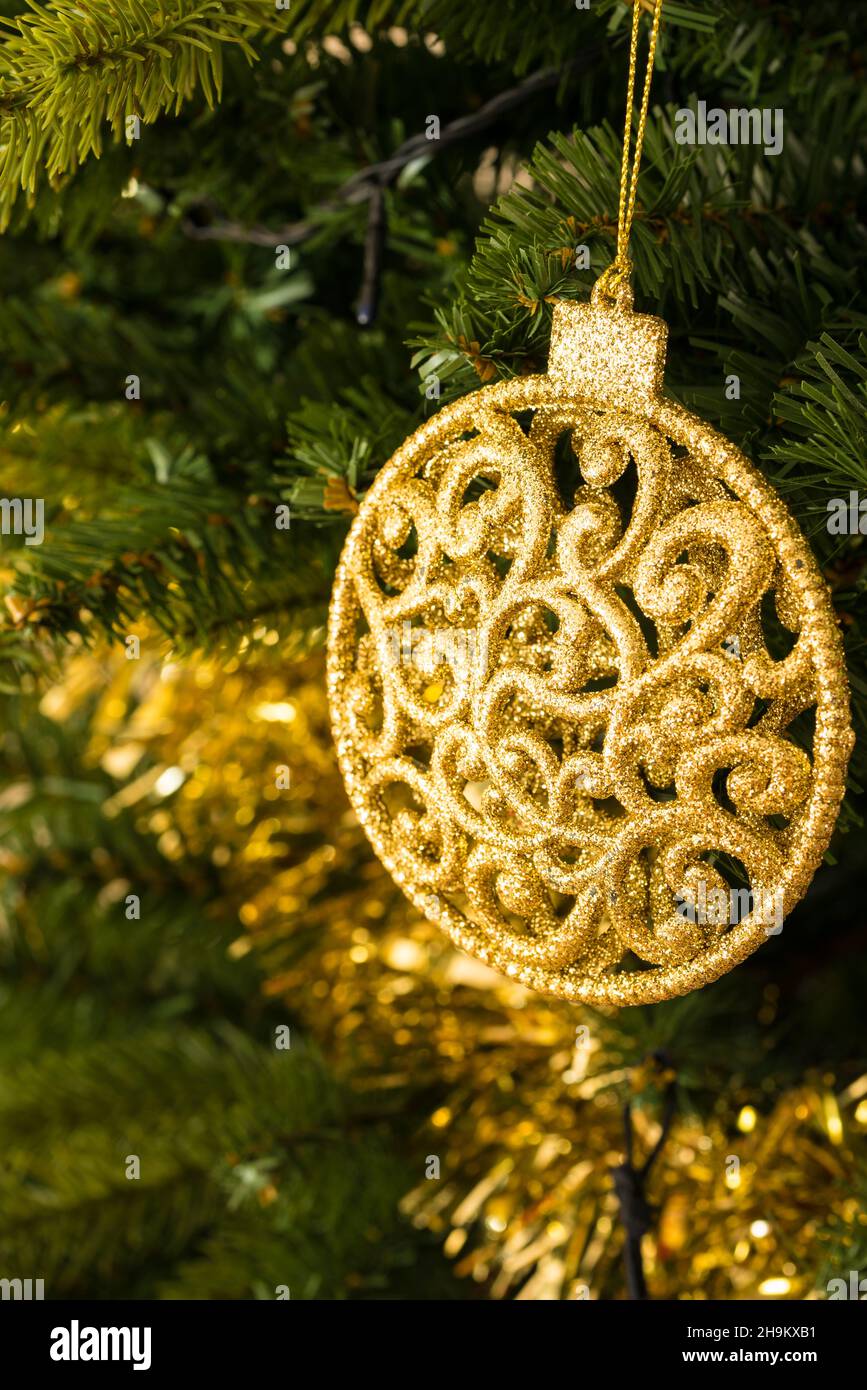 Christmas dinner table decoration with pine branches and golden cones.  Christmas centerpiece with golden decor. Christmas party Stock Photo - Alamy