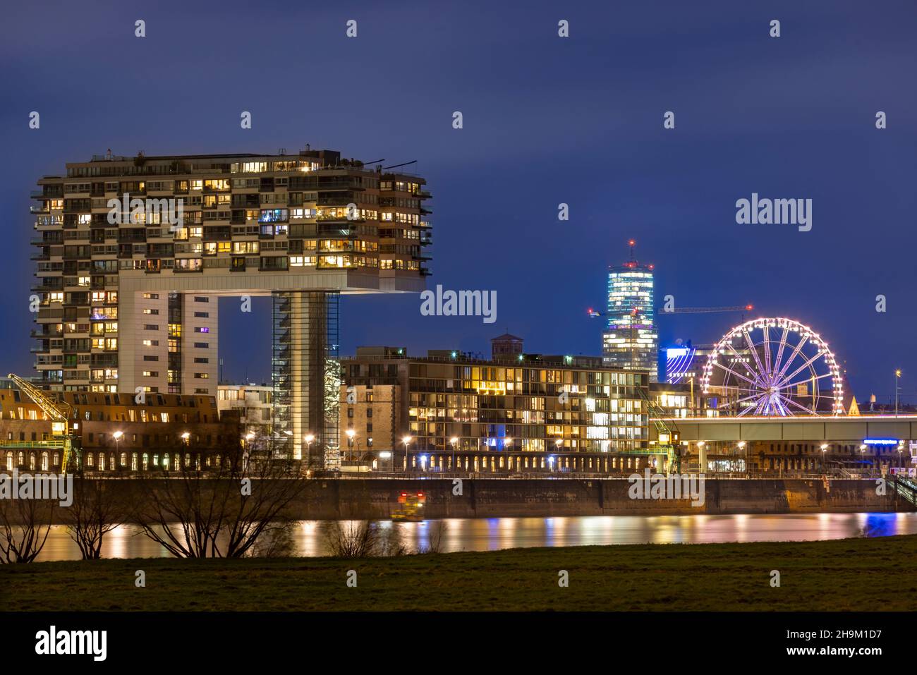 Illuminated buildings in Cologne night skyline Stock Photo - Alamy