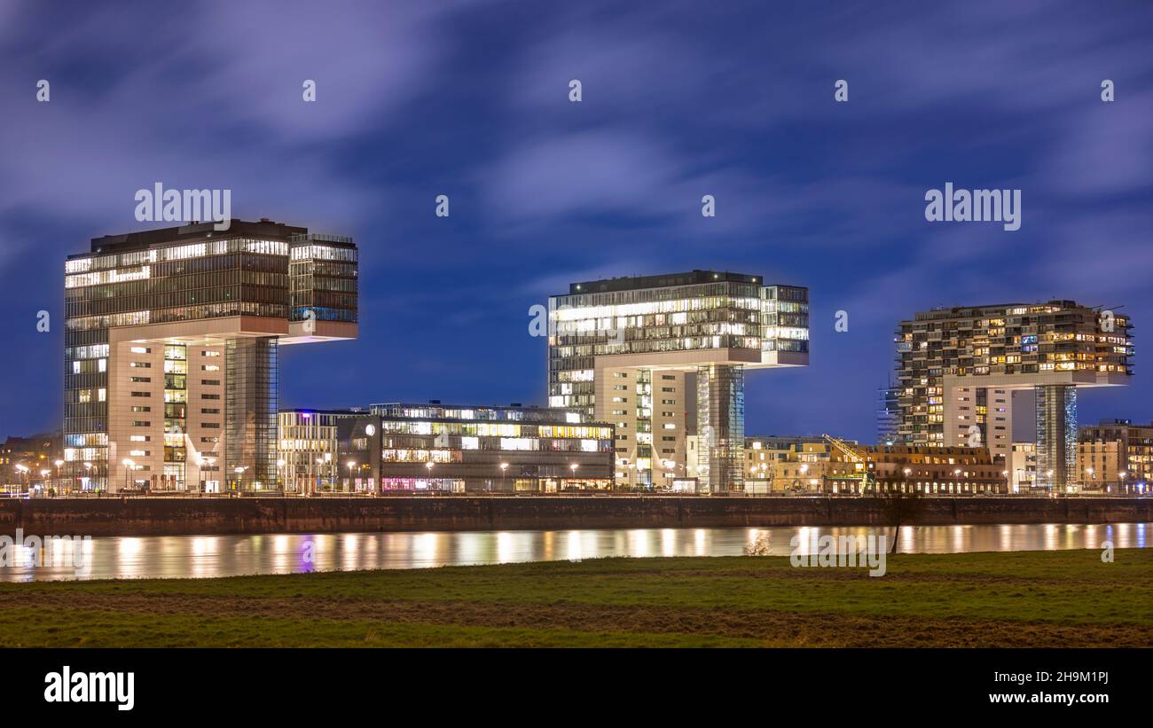 Illuminated buildings in Cologne night skyline Stock Photo - Alamy
