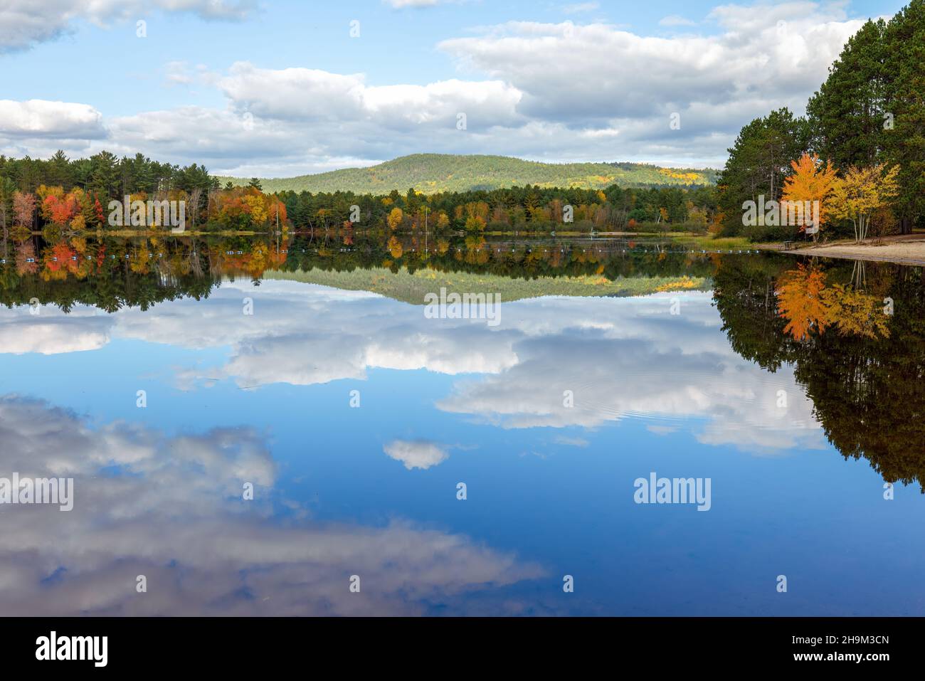 Fall colours on Lake in Driftwood Provincial Park Ontario Canada Stock