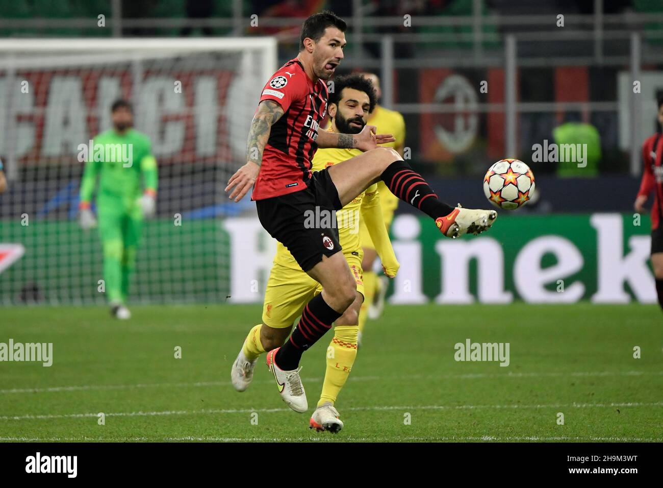 Milano, Italy. 07th Dec, 2021. Alessio Romagnoli of AC Milan and Mohamed  Salah of Liverpool during the Uefa Champions League group B football match  between AC Milan and Liverpool at San Siro