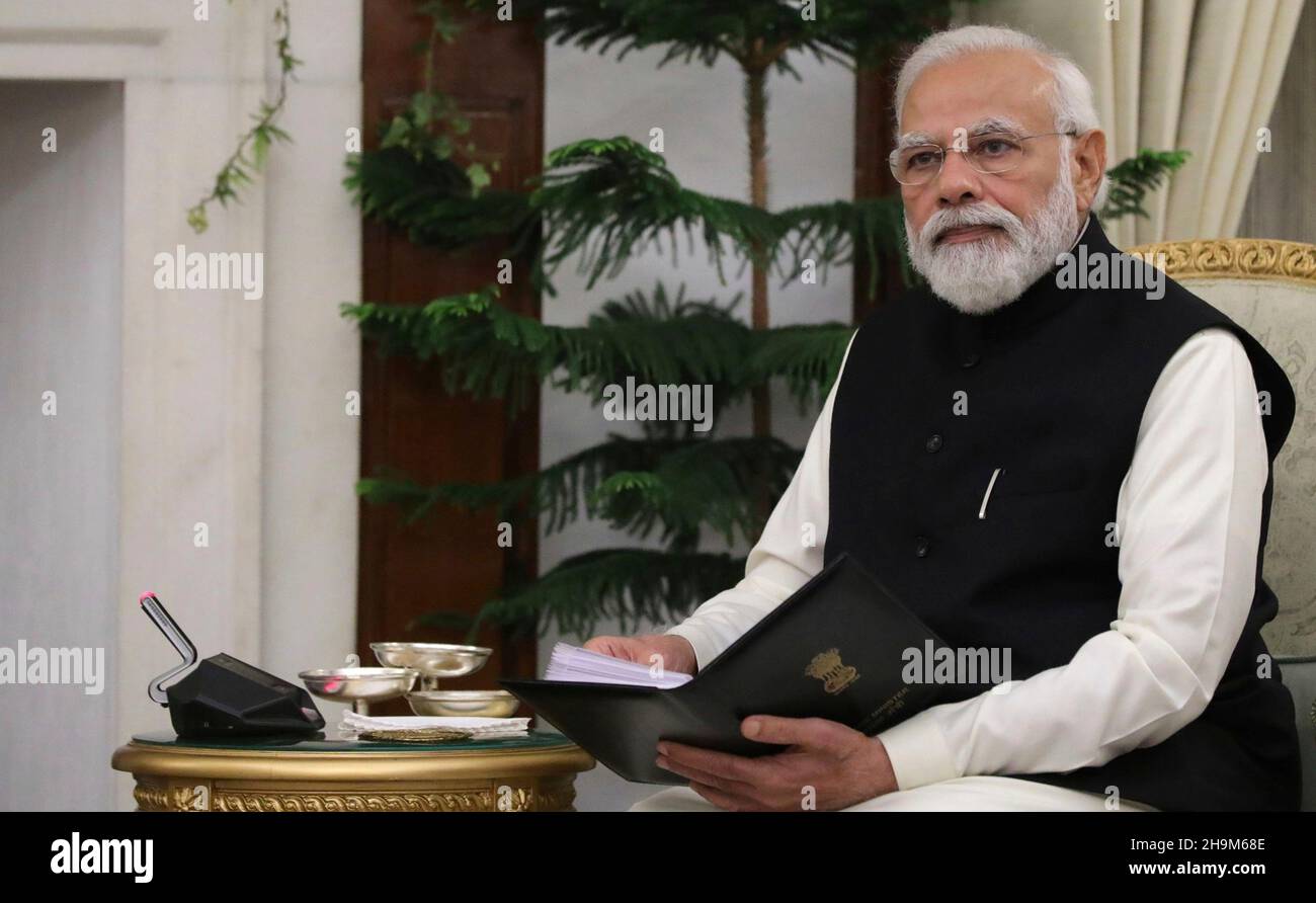 New Delhi, India. 06 December, 2021. Indian Prime Minister Narendra Modi listens to Russian President Vladimir Putin during a bilateral meeting at Hyderabad House, December 6, 2021 in New Delhi, India.  Credit: Mikhail Klimentyev/Russian Government/Alamy Live News Stock Photo