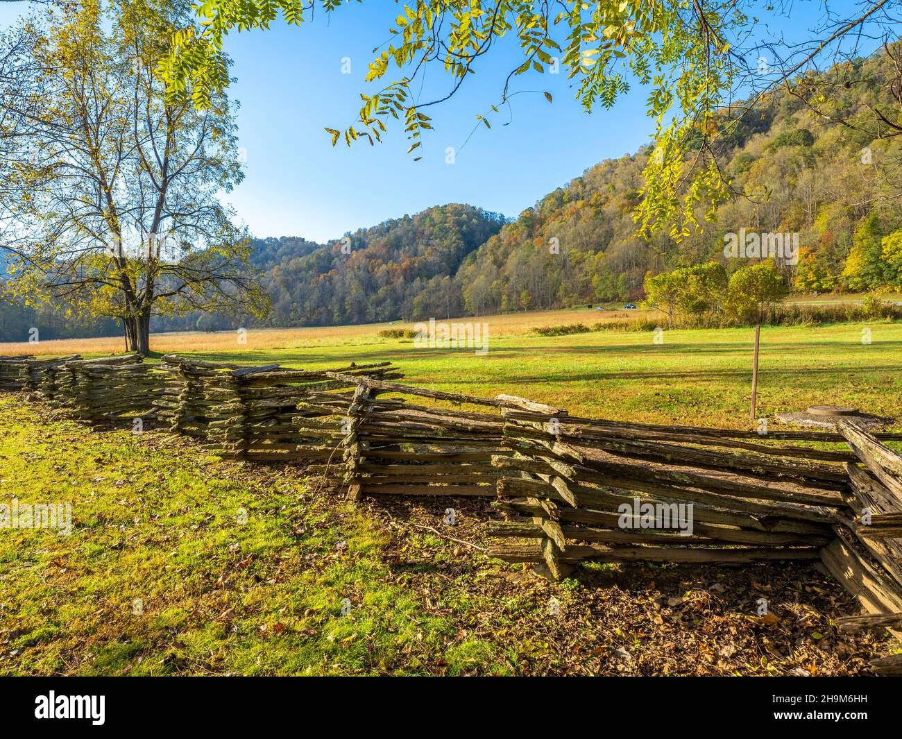 19th century Mountain Farm Museum at the Oconaluftee Visitors Center in the Great Smoky Mountains National Park in North Carolina USA Stock Photo