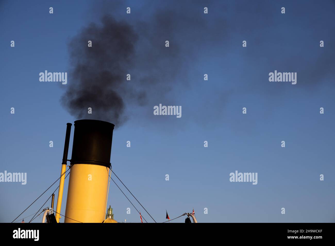Air pollution in Stockholm. Chimney of boat with black smoke coming out ...