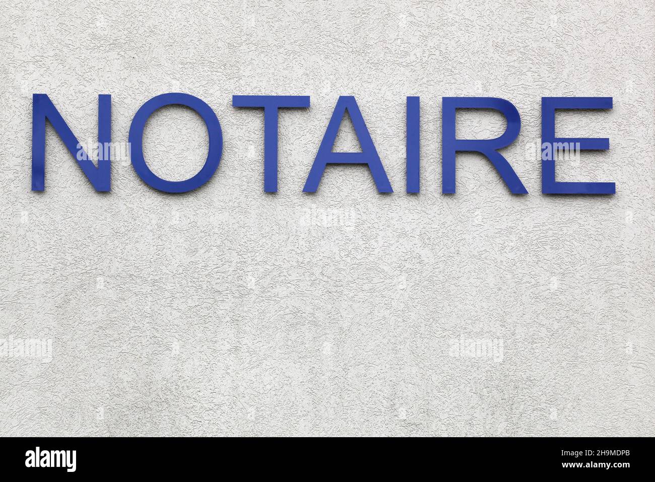 Sign of notary on a wall in France called notaire in french language Stock Photo