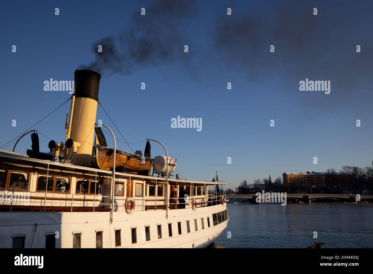 Air pollution in Stockholm. Chimney of boat with black smoke coming out ...