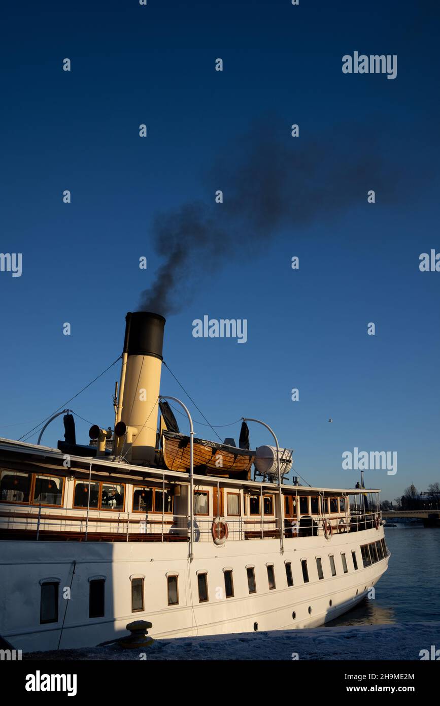 Air pollution in Stockholm. Chimney of boat with black smoke coming out ...