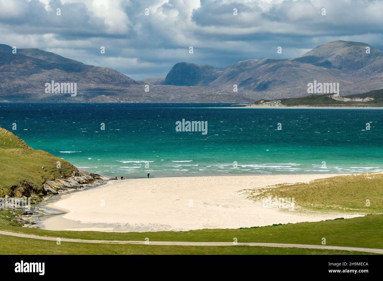 Sandy beach at Horgabost (Traigh Niosaboist) with the mountains of the Harris in the distance on the remote Hebridean Island of Harris, Scotland, UK Stock Photo