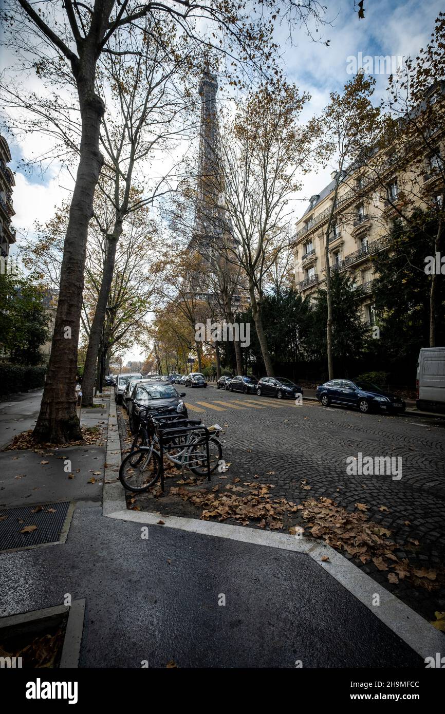 A back alley in Paris showcasing the architecture of the buildings with ...