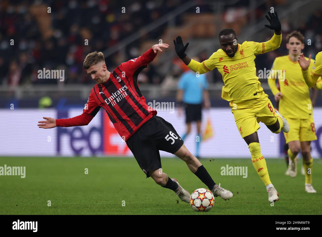 Milan, Italy, 7th December 2021. Baby Keita of Liverpool clashes with Alexis Saelemaekers of AC Milan during the UEFA Champions League match at Giuseppe Meazza, Milan. Picture credit should read: Jonathan Moscrop / Sportimage Credit: Sportimage/Alamy Live News Stock Photo