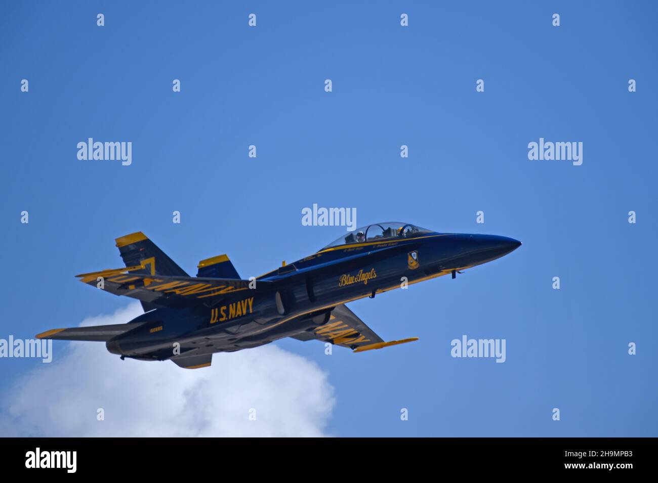 Blue Angel 7 passes crowd line with a lucky passenger Stock Photo