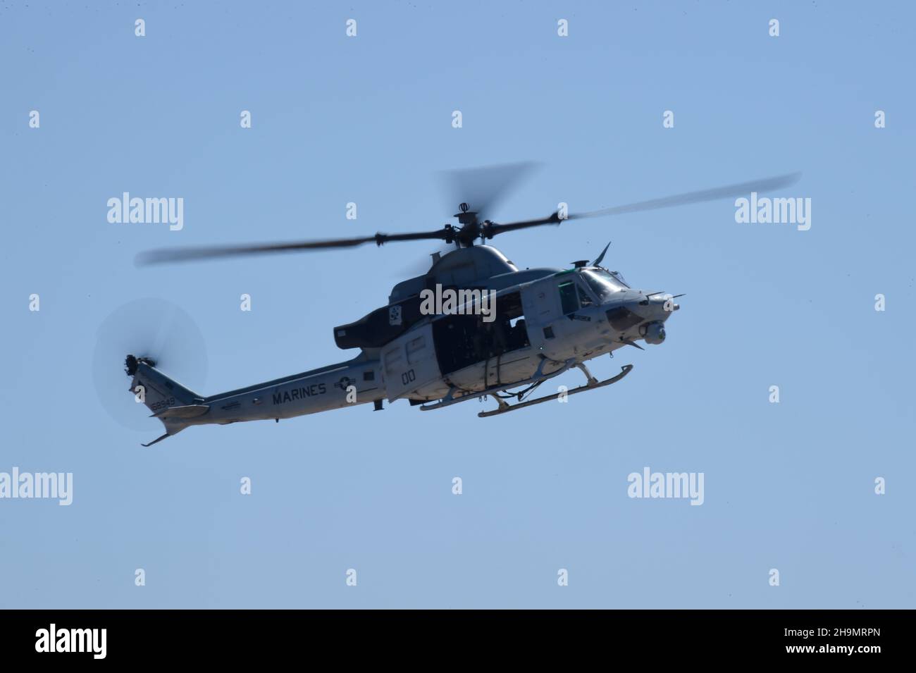 USMC UH-1Y Venom helicopter approaches the LZ during a MAGTF demonstration at MCAS Miramar in San Diego, California. Stock Photo