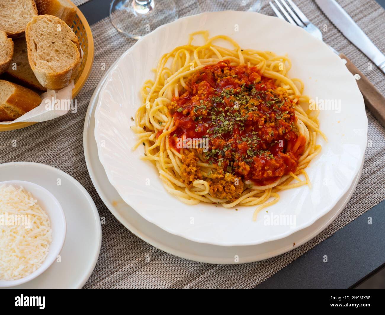 Spaghetti bolognese seasoned with aromatic dried herbs Stock Photo Alamy