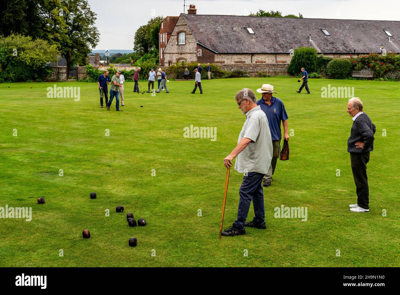 Every Saturday Groups Of Local Men Play A Form Of Bowls Similar To That Played In The 16th Century On The Castle Bowling Green, Lewes, East Sussex, UK Stock Photo