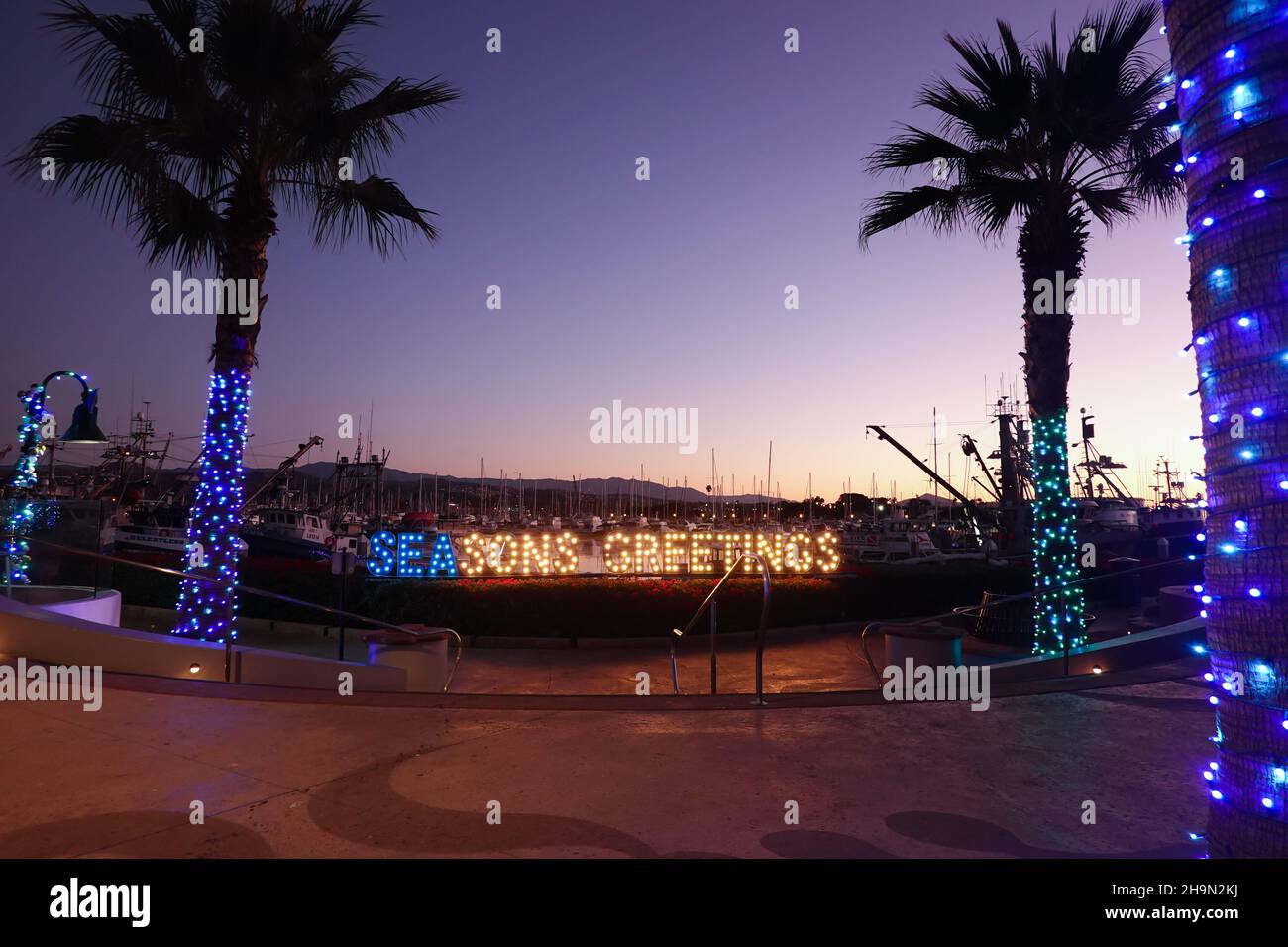 Seasons  greetings light display at Ventura Harbor, California, USA Stock Photo