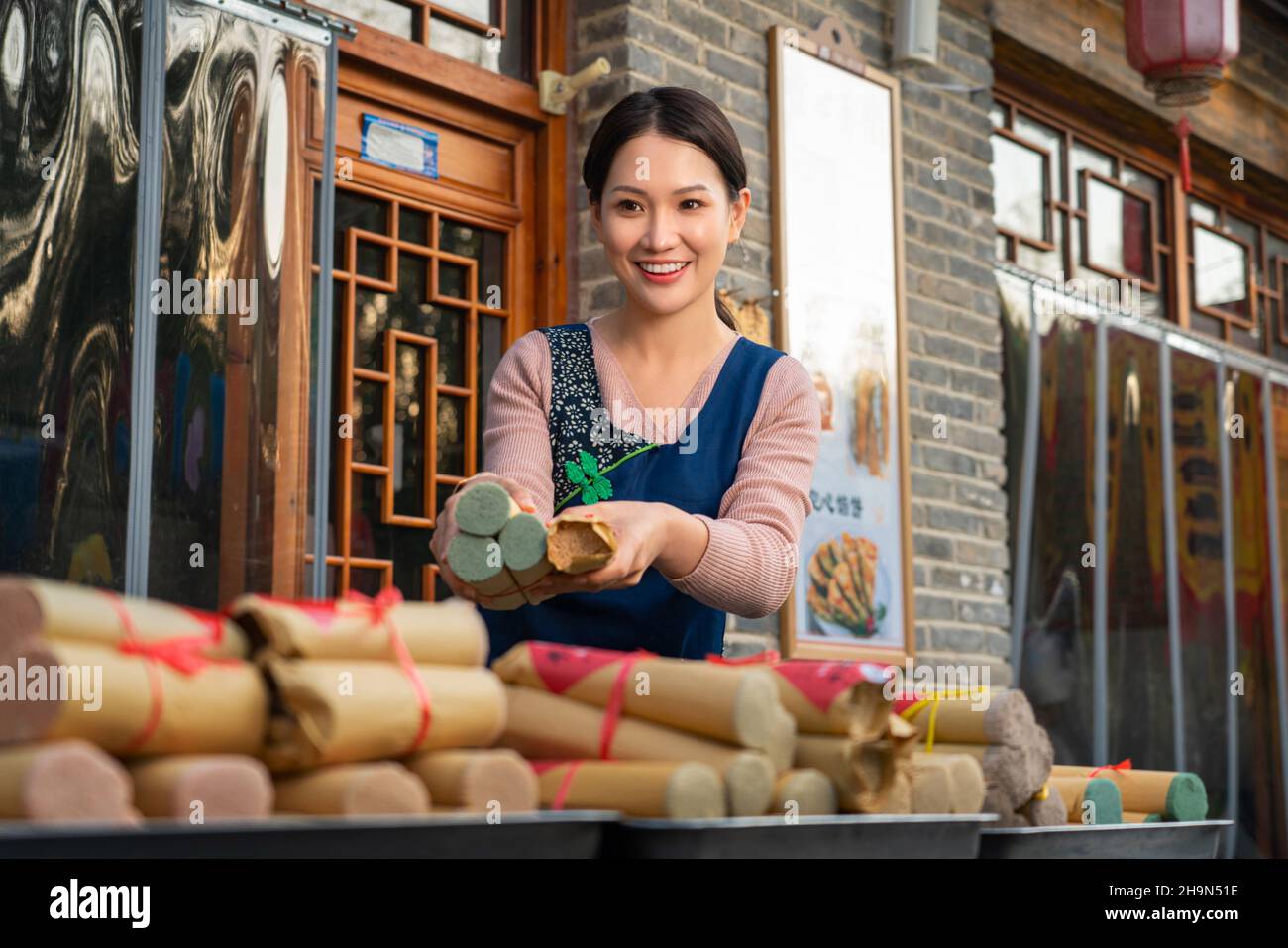 The enthusiasm of the waiter selling noodles Stock Photo