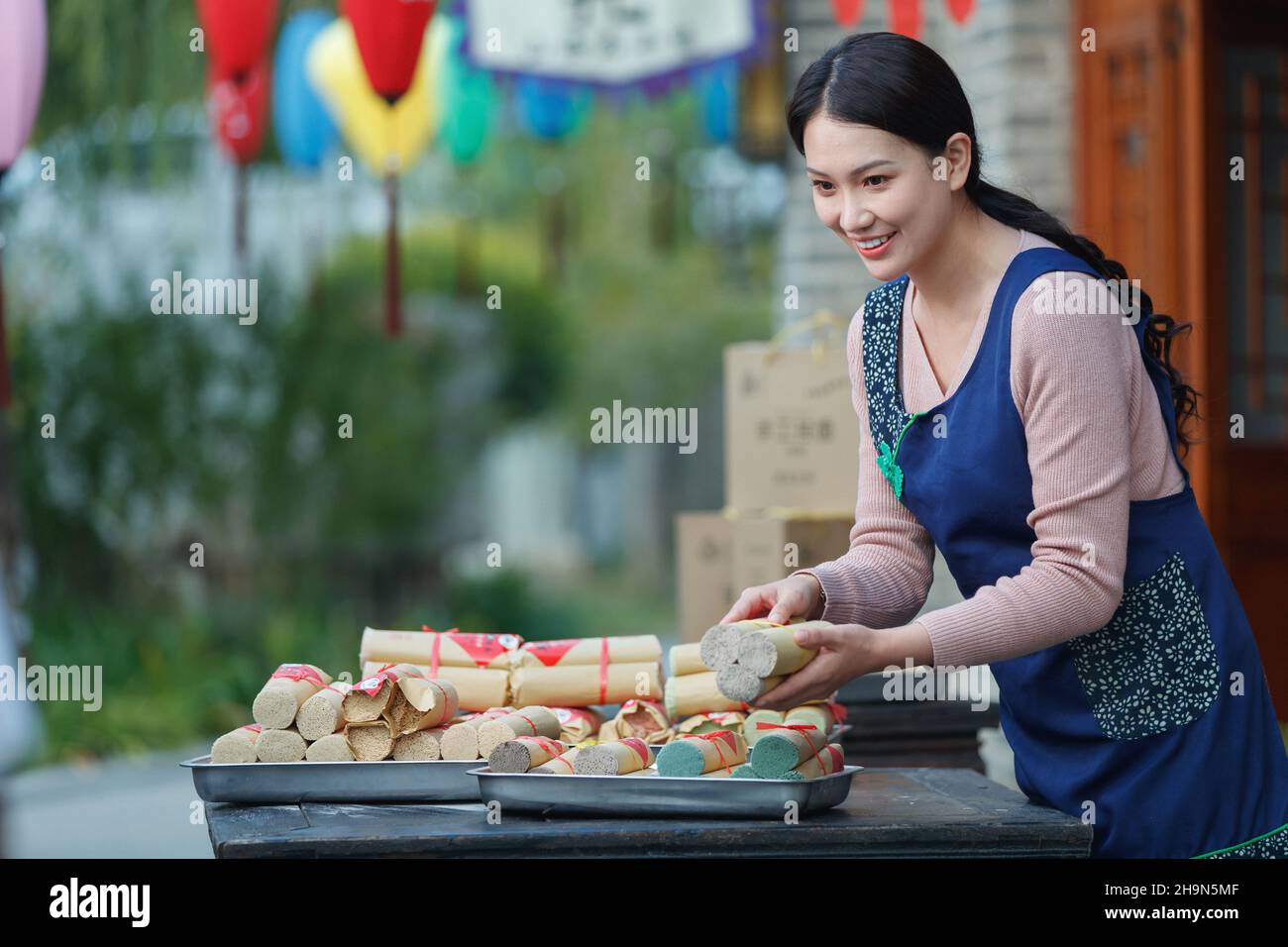 The enthusiasm of the waiter selling noodles Stock Photo