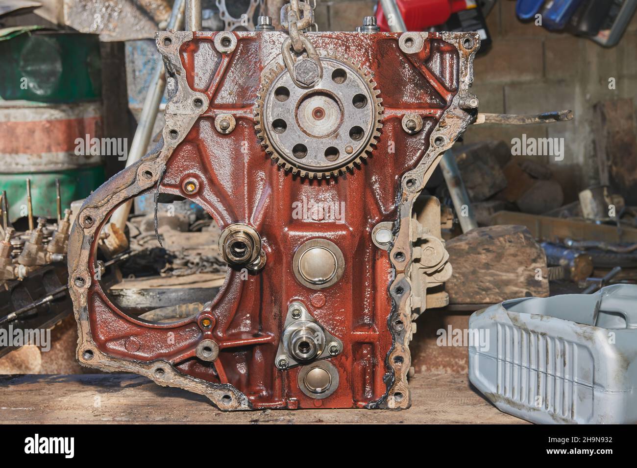 Front View of Car Engine and Camshaft Sprocket and Bolt and Chain in