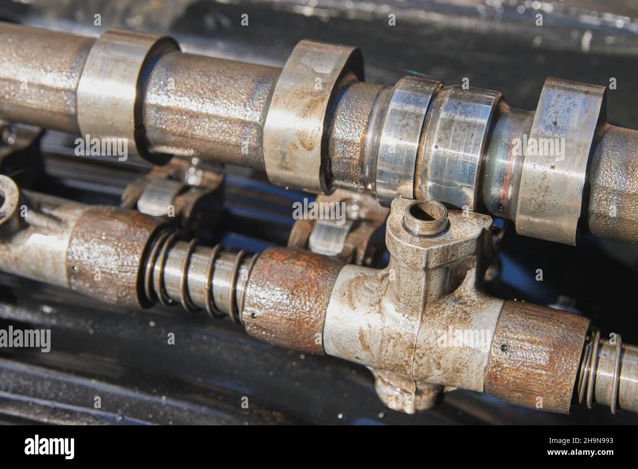 Overhead Camshaft and Rocker Arm and Spring of Car Engine Stock Photo