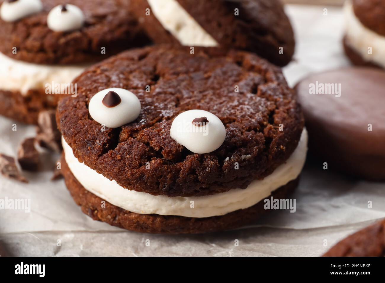 Funny cookie for Halloween on table, closeup Stock Photo
