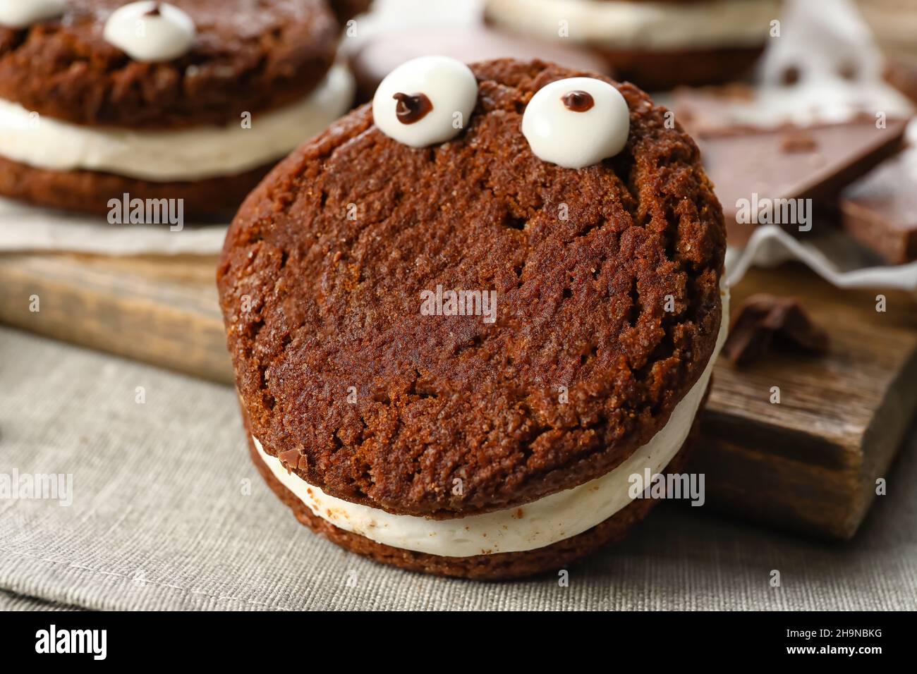 Funny cookie for Halloween on table, closeup Stock Photo