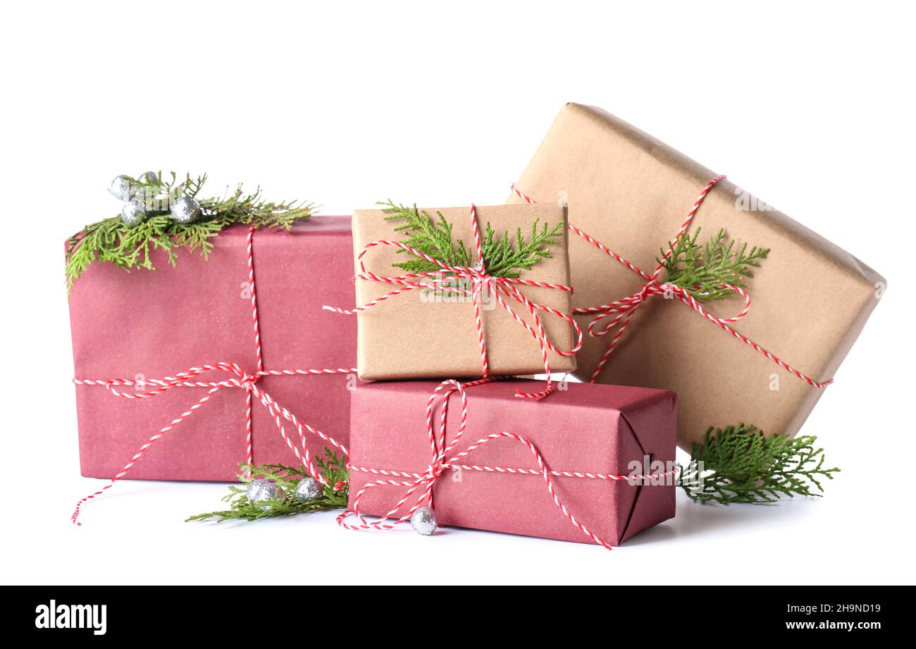 Beautiful Christmas gift boxes and decor isolated on white background ...