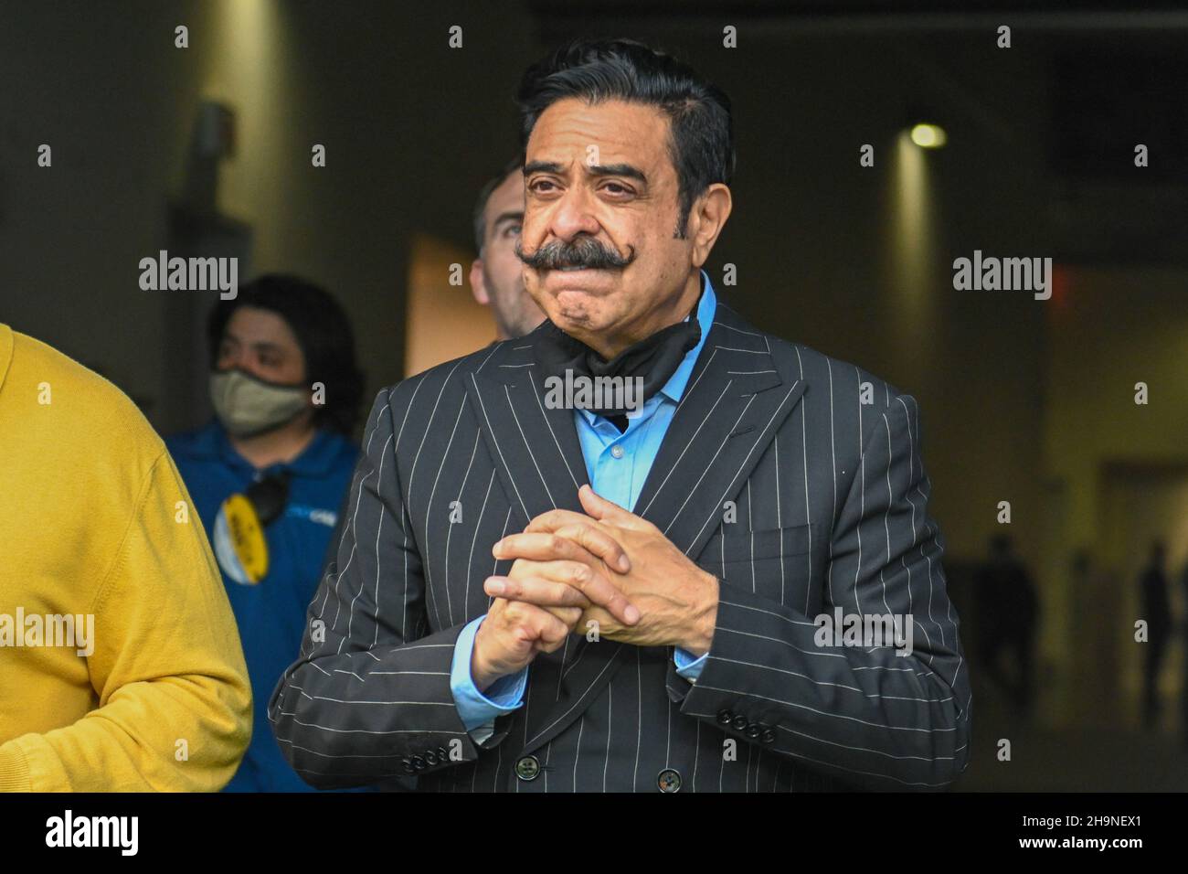 Jacksonville Jaguars owner Shahid Khan arrives at the SoFi Stadium field before an NFL game