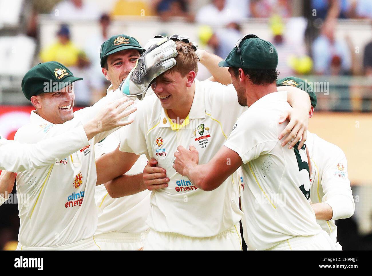 Australia's Cameron Green celebrates the wicket of England's Ollie Pope during day one of the first Ashes test at The Gabba, Brisbane. Stock Photo