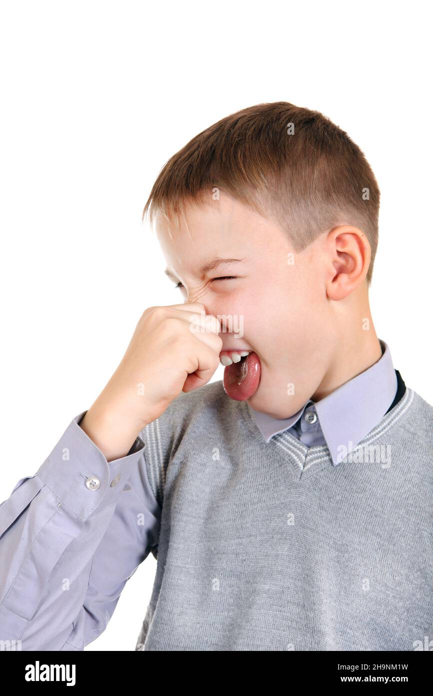 Displeased Kid Close the Nose Isolated on the White Background Stock Photo