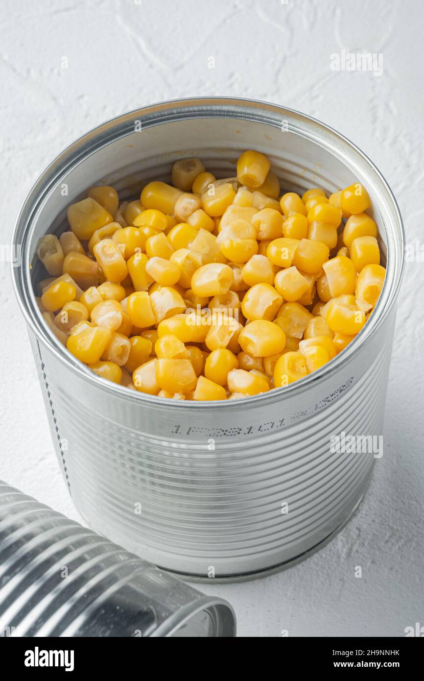 Canned corn in can, on white background Stock Photo - Alamy