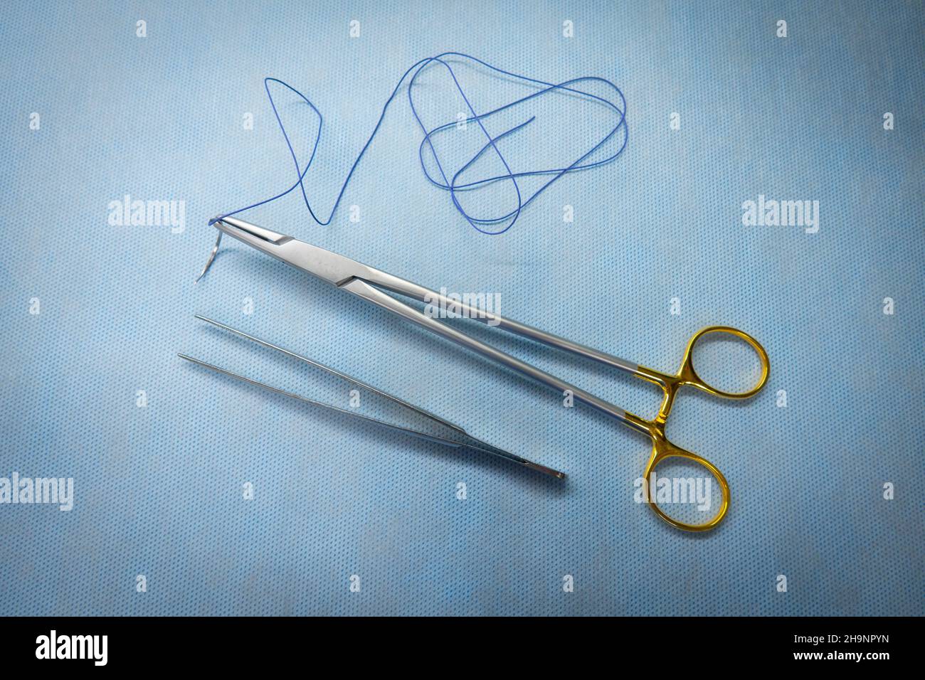 Needle holder hi-res stock photography and images - Alamy