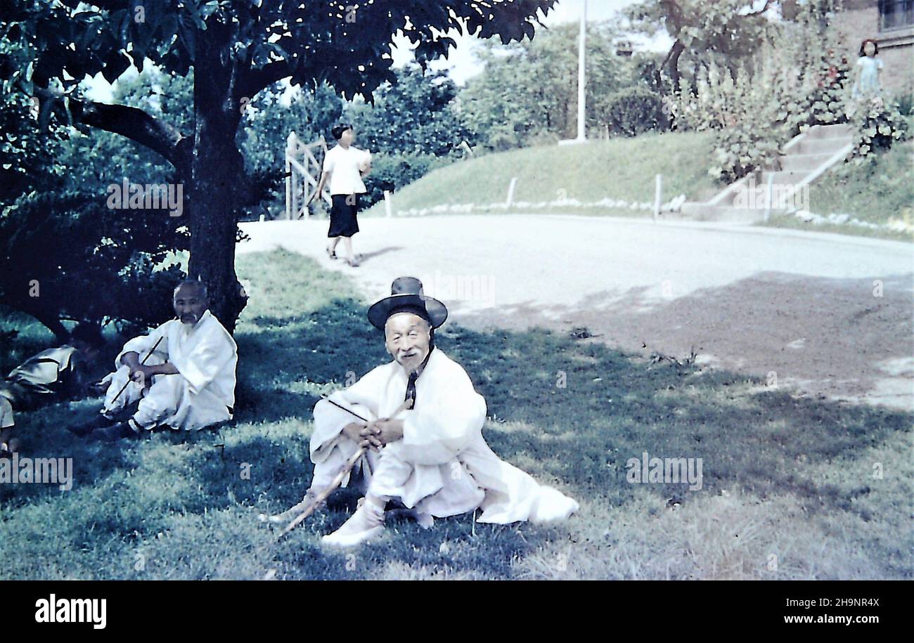 Two Korean Old Men Smoking Pipes Stock Photo Alamy